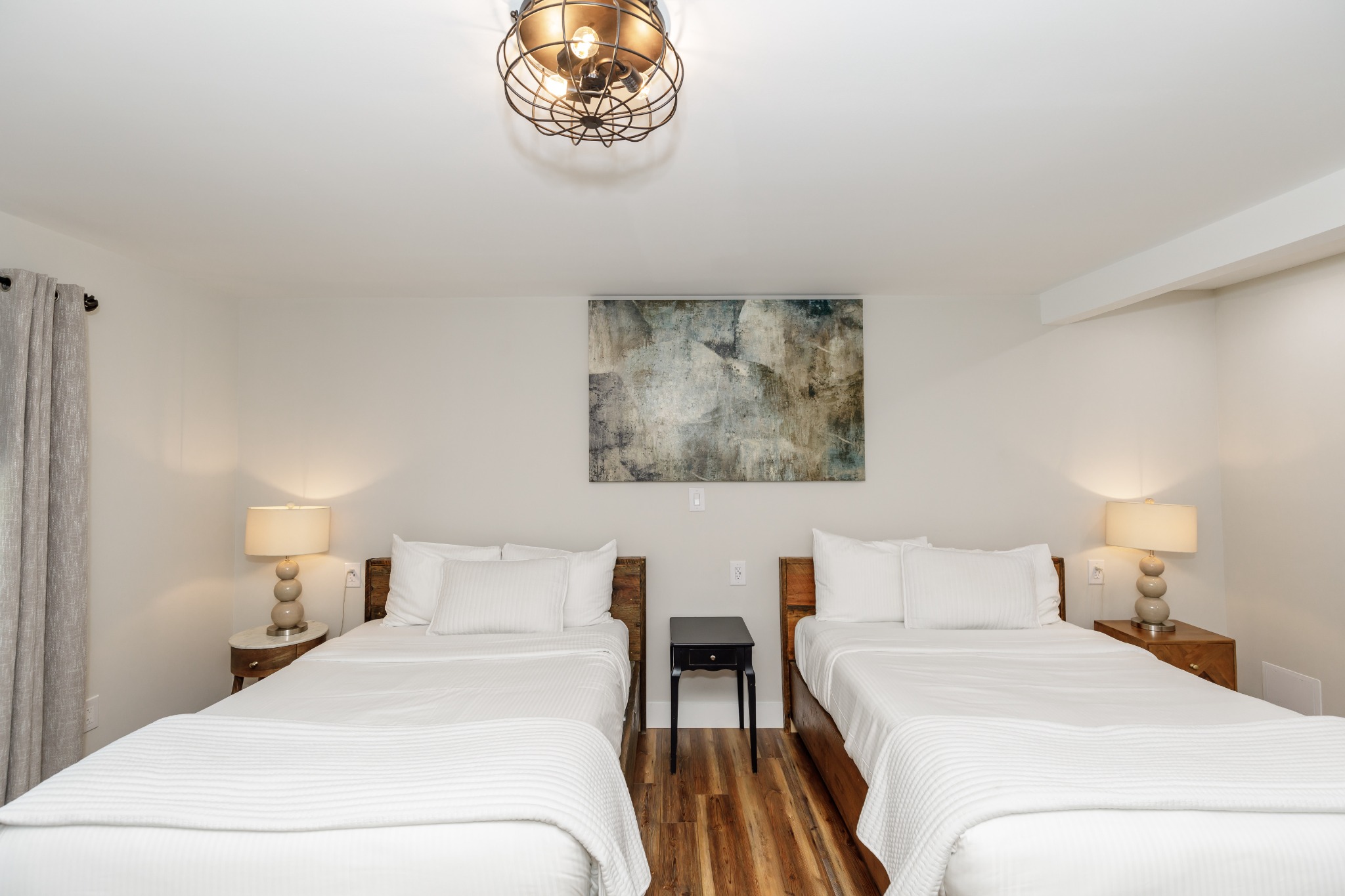 Two-bed guest room at The Inn at Warm Springs