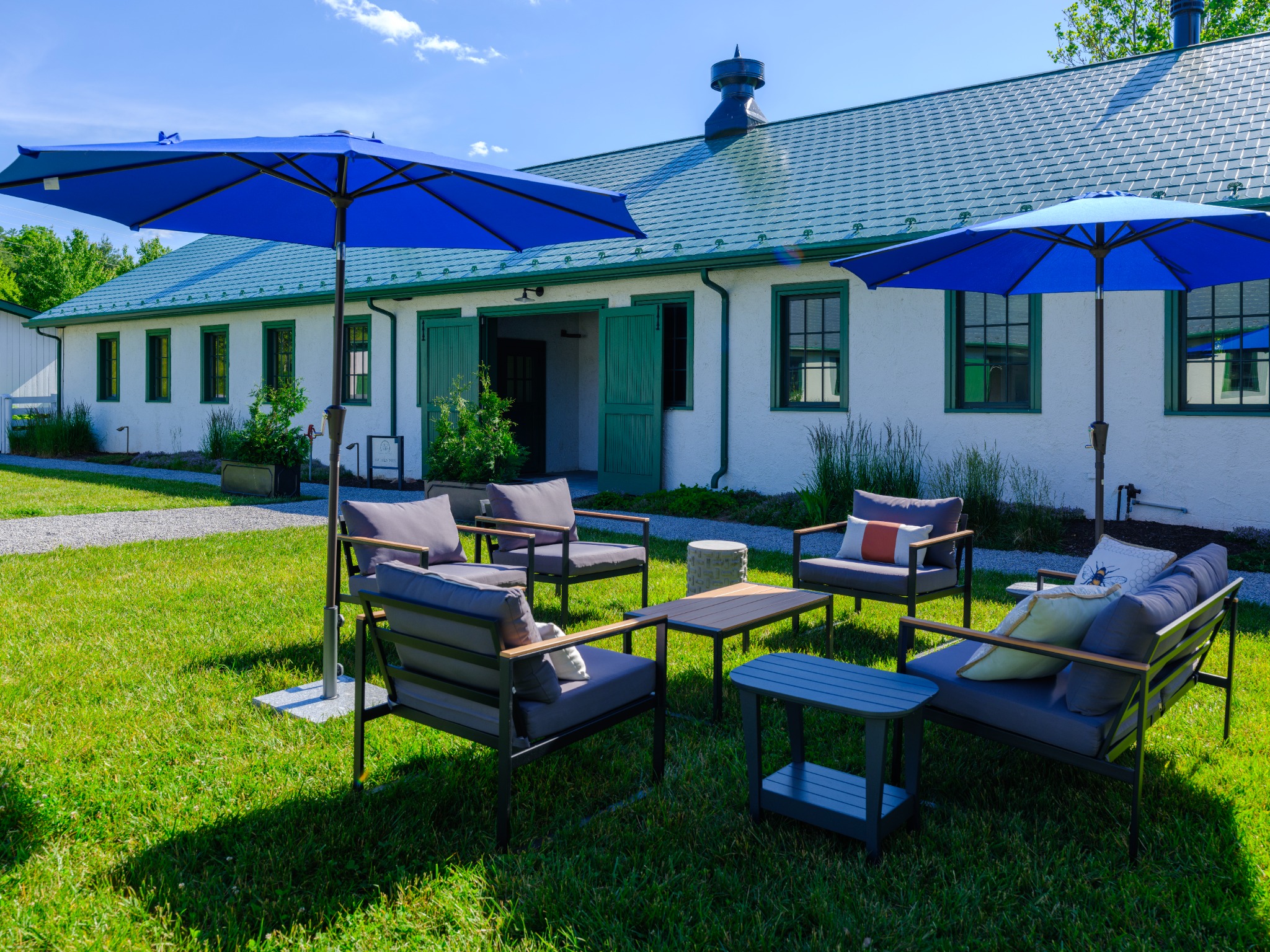 Outdoor lounge furniture arranged on the lawn
